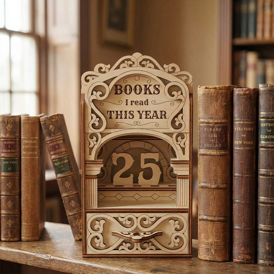 Laser cut book nook digital design placed between vintage books, featuring a wooden bookshelf insert to track books read this year.