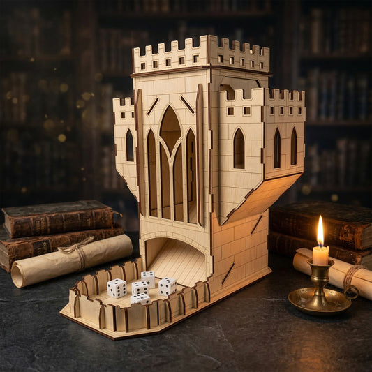 A gothic-style dice tower made of laser cut plywood with natural wood grain. Six white dice sit in the walled landing tray. The medieval castle design features battlements and etched bricks, displayed among vintage books and a lit candle.