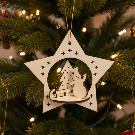 Intricate laser cut Christmas Snowman toy featuring a 3D snowy scene of a smiling snowman, holiday tree and present inside a star silhouette, set against a warm lighted Christmas tree background.