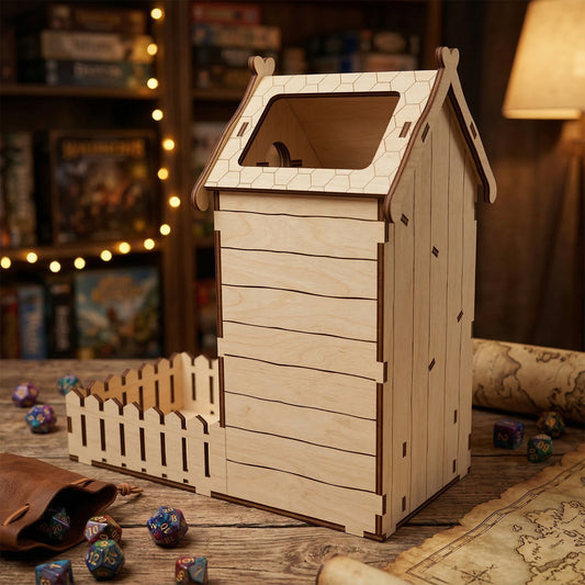 Side view of the birdhouse dice tower made of laser cut plywood, showing horizontal siding details and a large roof opening for dropping dice. Positioned on a wooden table with a leather dice bag and a fantasy map scroll.