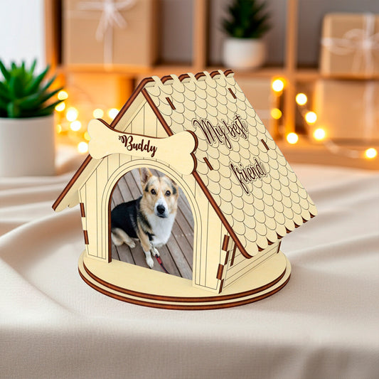 Laser cut wooden plywood dog house photo frame displaying a dog photo inside. The roof has an intricate scalloped shingle design with the inscription "My best friend" etched into the side, emphasizing the personalized pet memorial or gift aspect. A bone name tag is visible above the door.