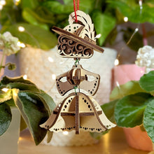 Load image into Gallery viewer, Laser cut project: whimsical fairy ornament for display.
