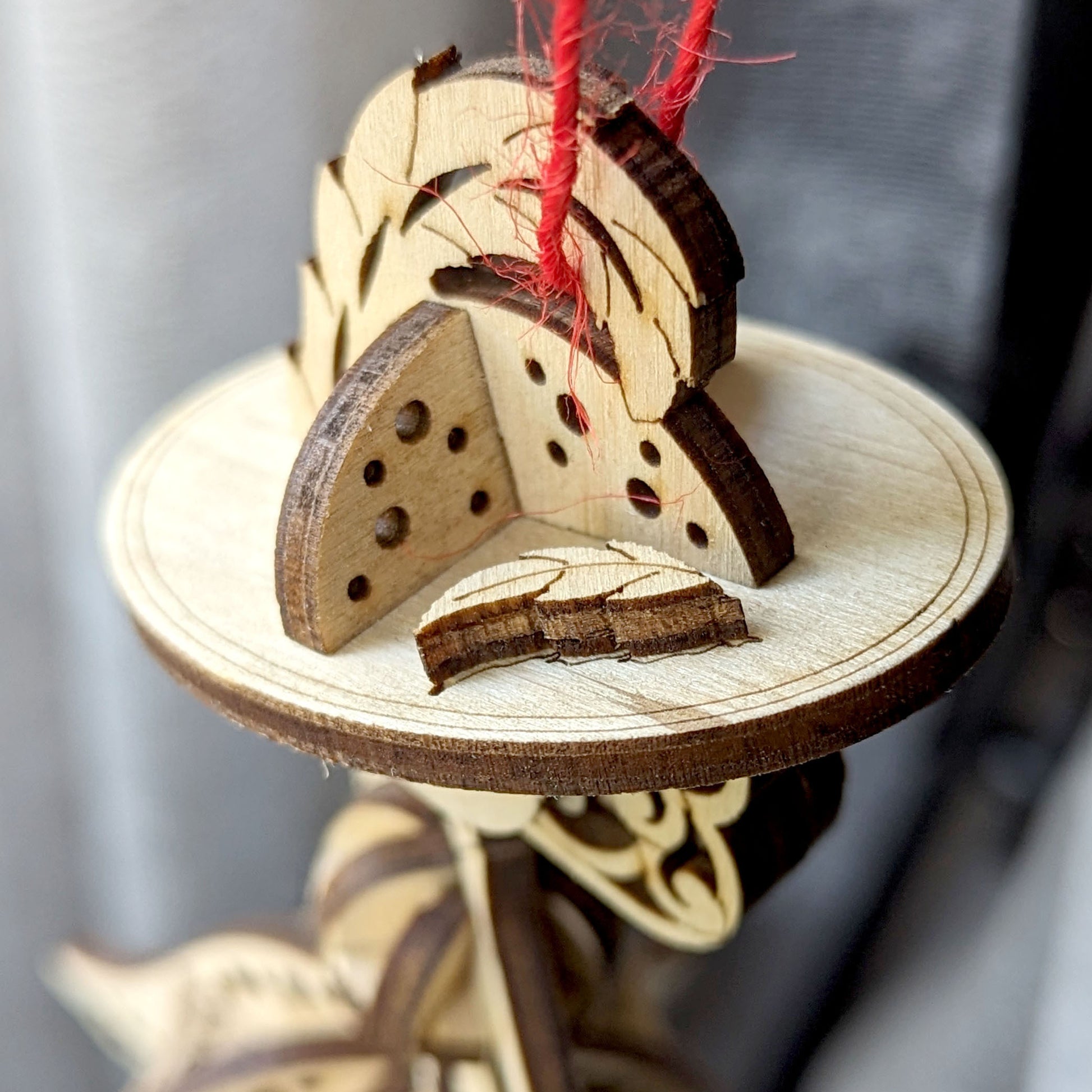 Miniature laser cut model: fairy ornament with customizable design.