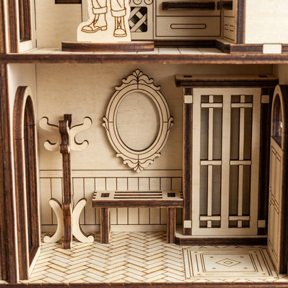 Wooden model of a room with furniture and decor