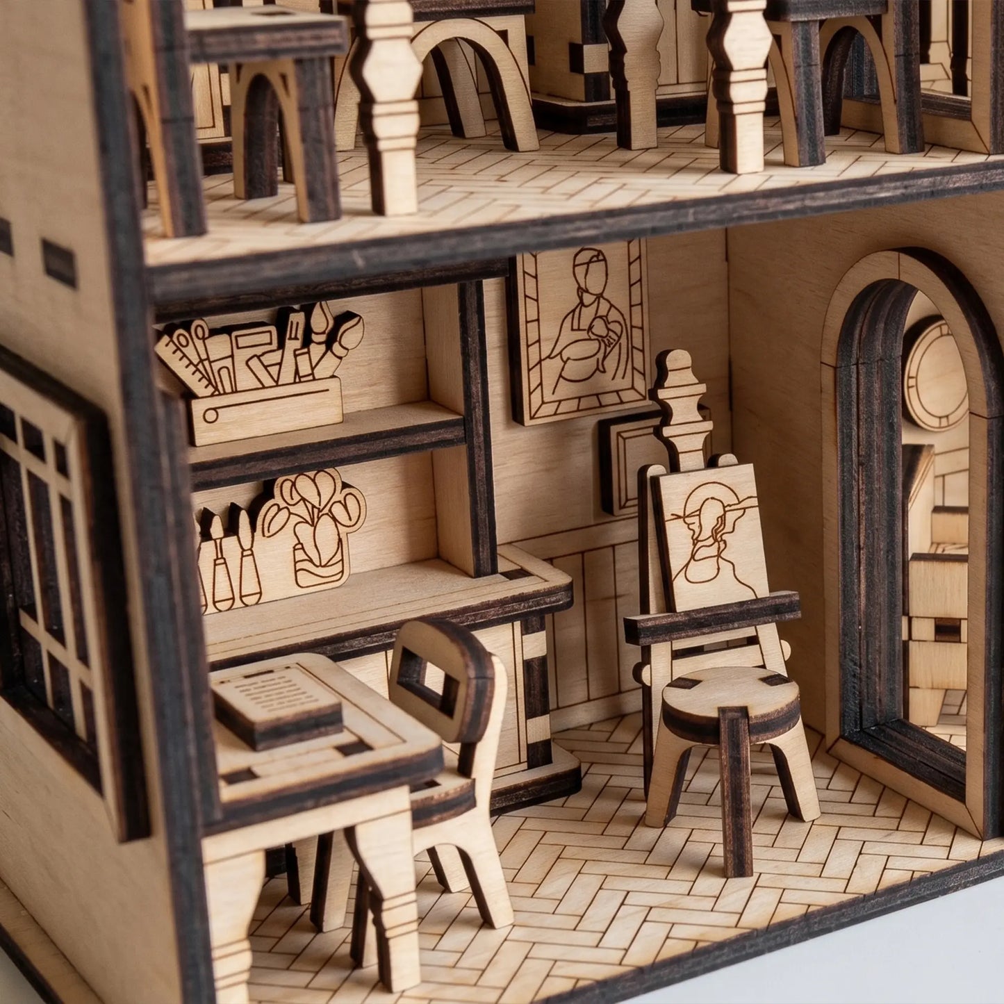 Wooden dollhouse with laser-cut furniture and decorations
