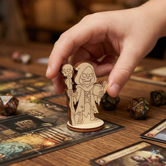 An action shot of a person's hand placing a wooden laser-cut necromancer figurine on a dungeon-themed tabletop game board. Surrounded by polyhedral dice and gaming cards, highlighting the figurine's scale and use in a roleplaying game.