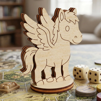 Detailed side view of a laser cut plywood pegasus figurine with engraved wings and tail, standing on a hex grid board game map.