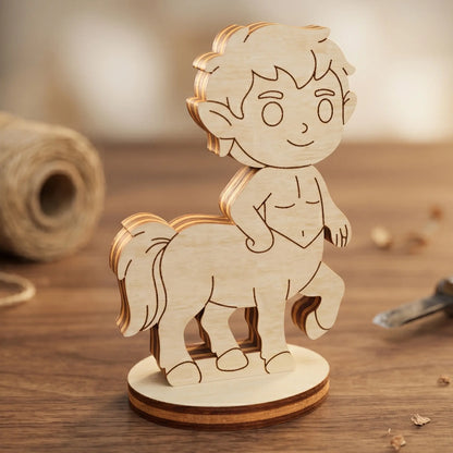 Detailed front view of a laser cut plywood centaur miniature with engraved features, standing in a workshop with twine nearby.