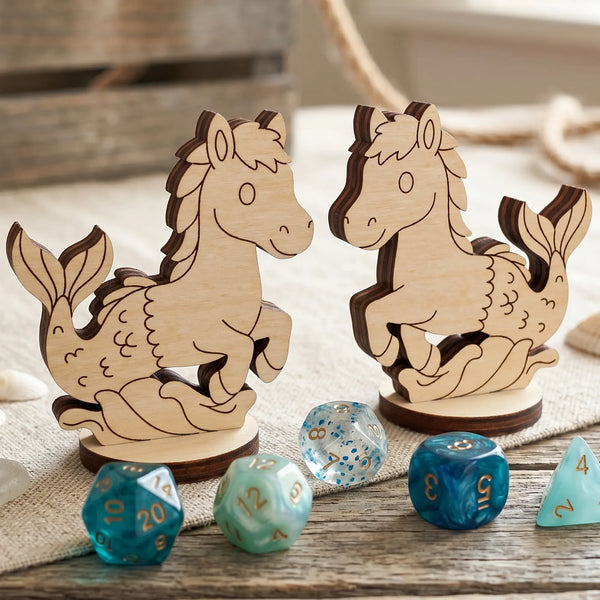 Front and back views of laser cut plywood mythical seahorse figurines on linen with blue and teal polyhedral gaming dice