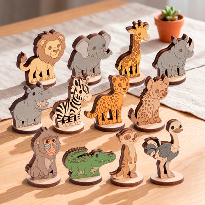 Set of colorful laser-cut plywood African animal figures on a table, including a lion, elephant, giraffe, and zebra