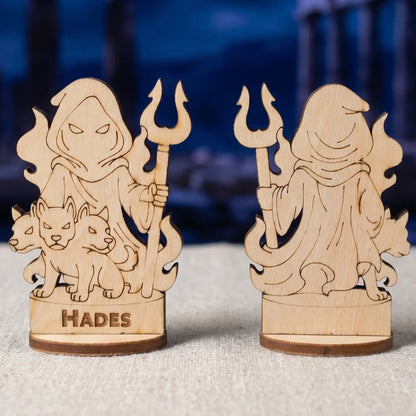 Front and back views of a laser cut plywood Hades figurine with three-headed Cerberus against blurred ancient night ruins