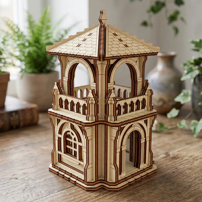 High angle view of a small decorative gothic bell tower building model constructed from polished laser cut plywood.