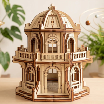 Front view of a miniature architectural palace model with a dome, assembled from multi-toned laser cut plywood sheets.