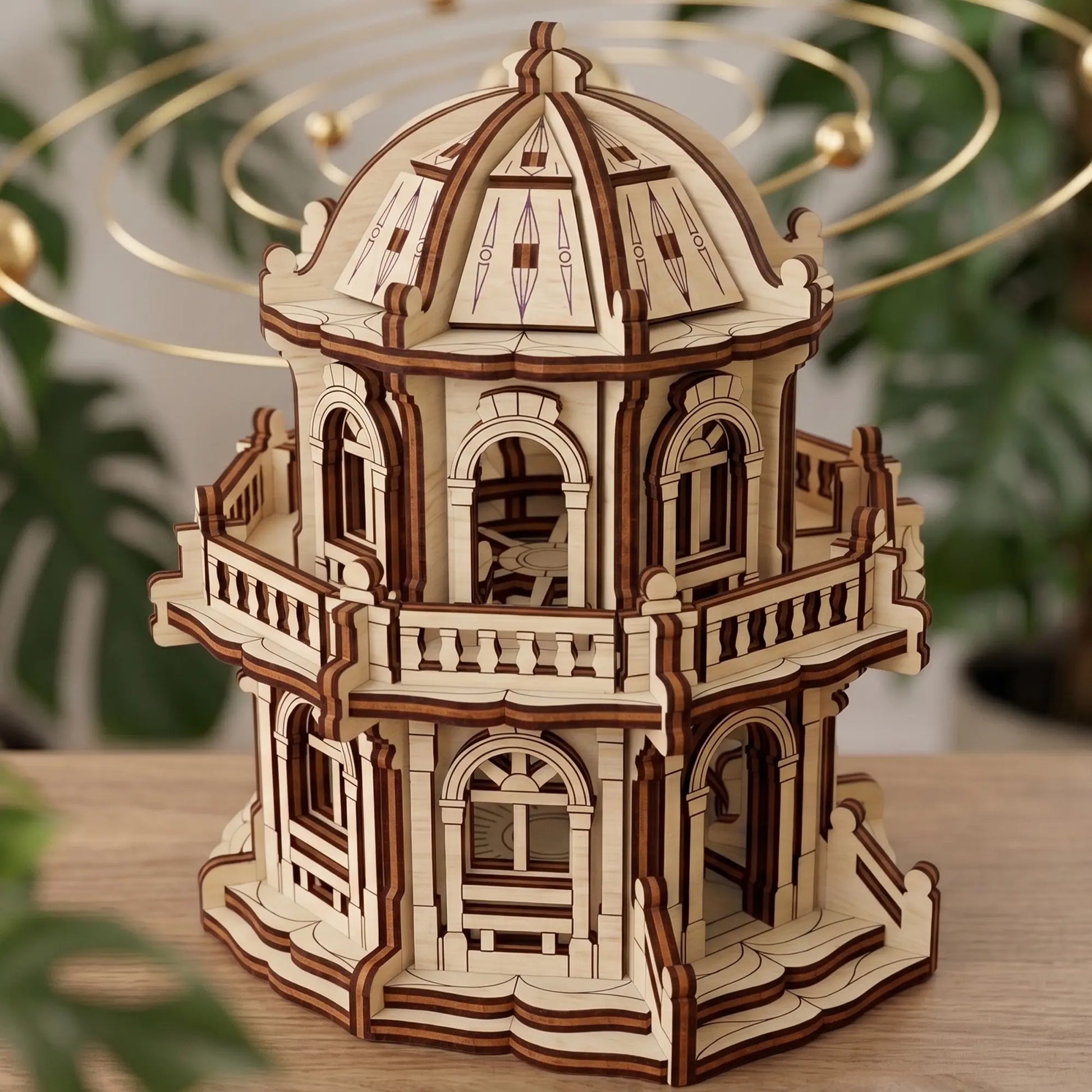 High angle view of a miniature wooden rotunda building with detailed balconies made from premium laser cut plywood.