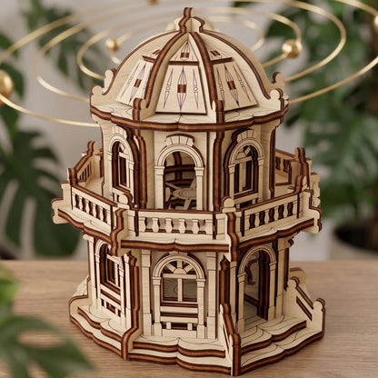 High angle view of a miniature wooden rotunda building with detailed balconies made from premium laser cut plywood.