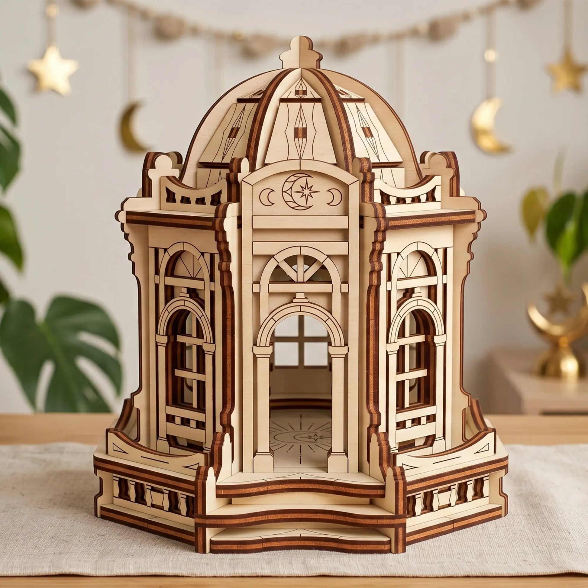 Front view of a miniature architectural dome palace with a crescent moon engraving, made of laser cut plywood.