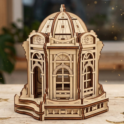 Side angle view of a completed miniature fantasy moon palace model built with dual-tone laser cut plywood wood.