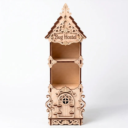 Front-facing studio view of an empty laser-cut birch plywood bug hostel with decorative trim and a carved wooden door.