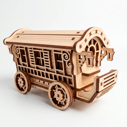A detailed side view of a fully assembled unpainted laser-cut plywood fairy nomad wagon model on a clean white background