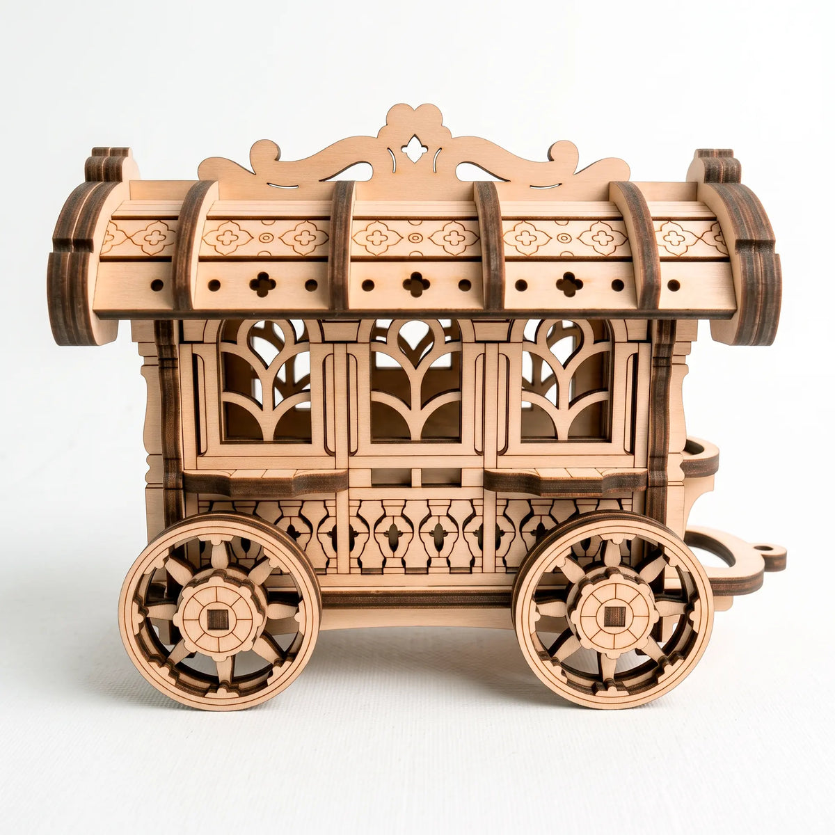 A detailed side view of a fully assembled unpainted laser-cut plywood fairy cart model displayed on a clean white background.