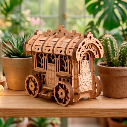 A natural laser-cut plywood fairy cart resting nicely on a wooden shelf next to potted green succulents and a tall cactus