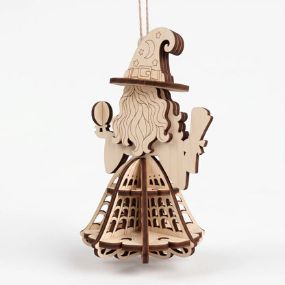 Back angle view of unpainted laser cut plywood witch ornament displaying pointed hat on white ground.