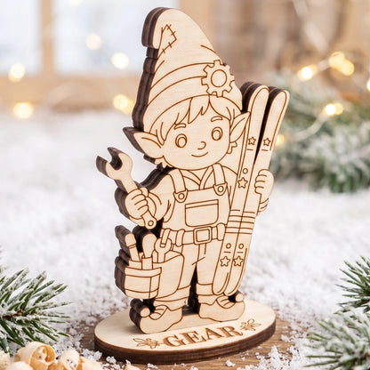 Unpainted laser cut plywood craftsman elf Gear figurine holding wrench and skis on snowy wooden table.