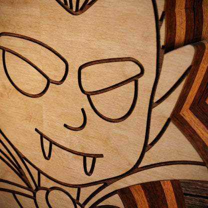 Wooden cutout of a face with glasses on a wooden background