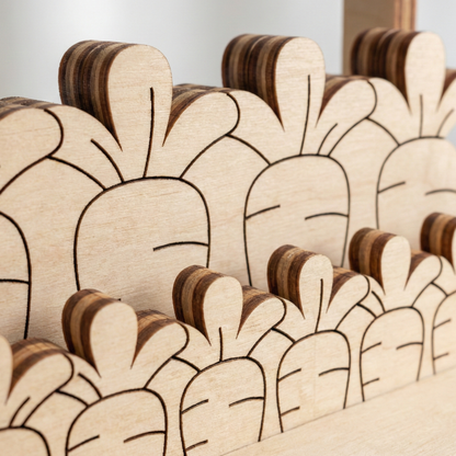 Wooden cutouts shaped like cartoon characters with a neutral background