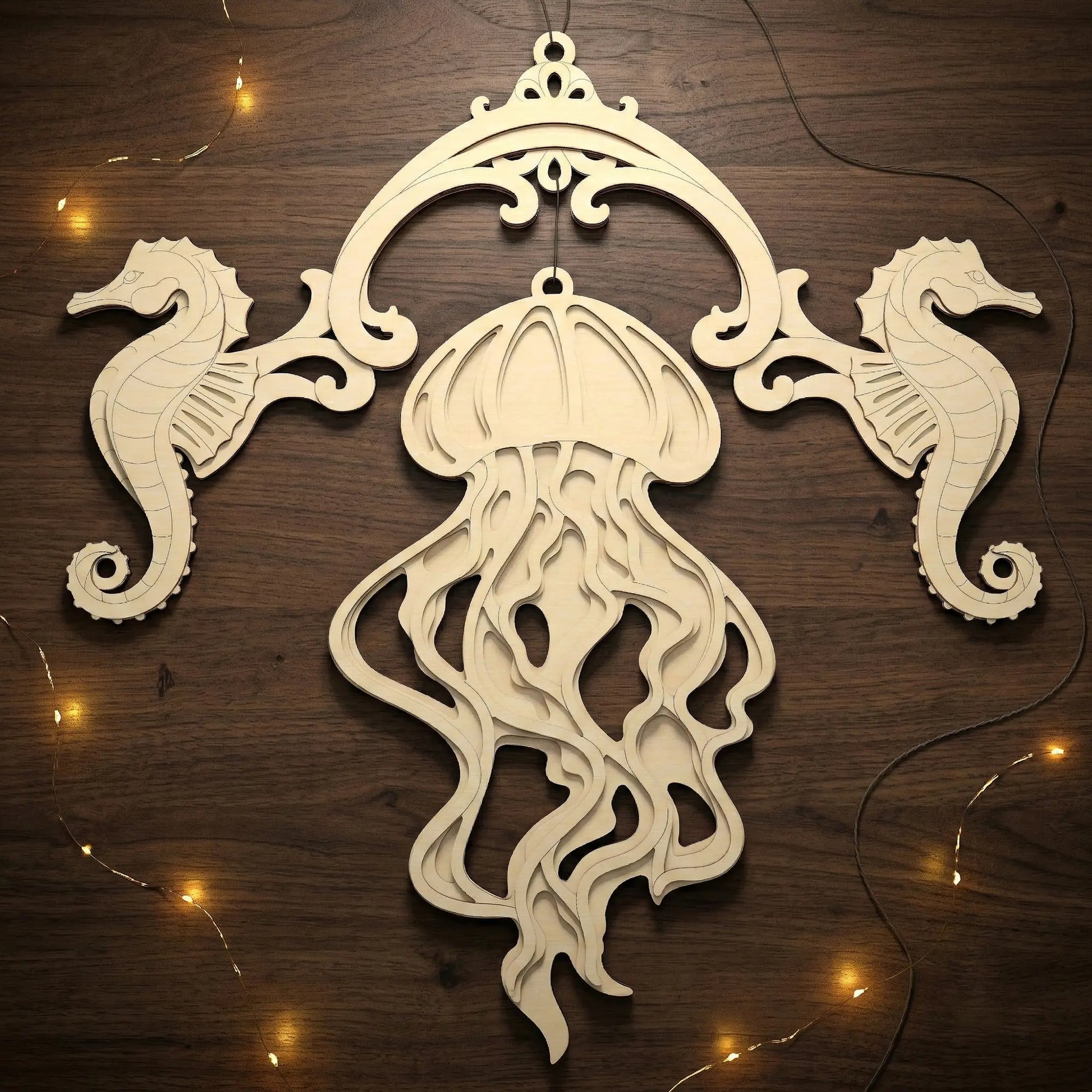 Decorative wooden wall hanging with seahorses and a jellyfish on a wooden background.