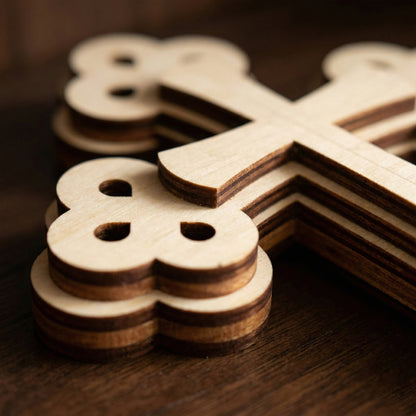 Wooden laser cut puzzle pieces on a wooden surface
