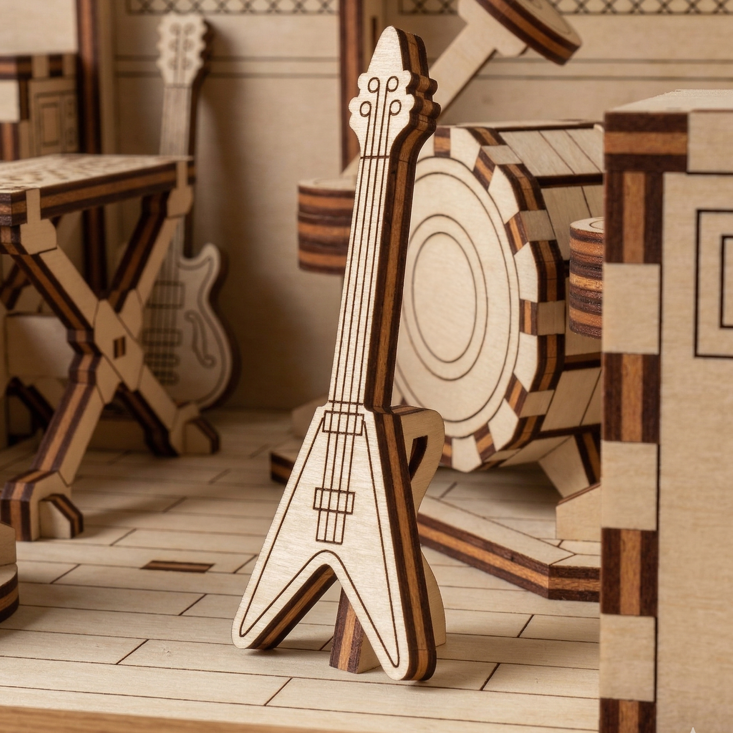 Wooden laser cut file model of a guitar in a room with musical instruments