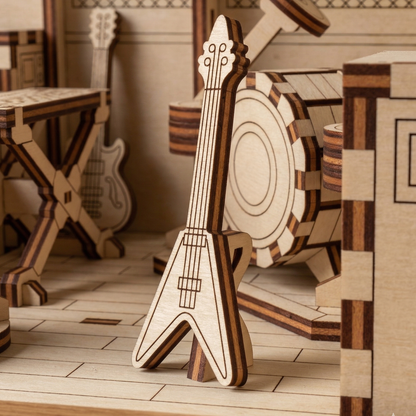 Wooden laser cut file model of a guitar in a room with musical instruments