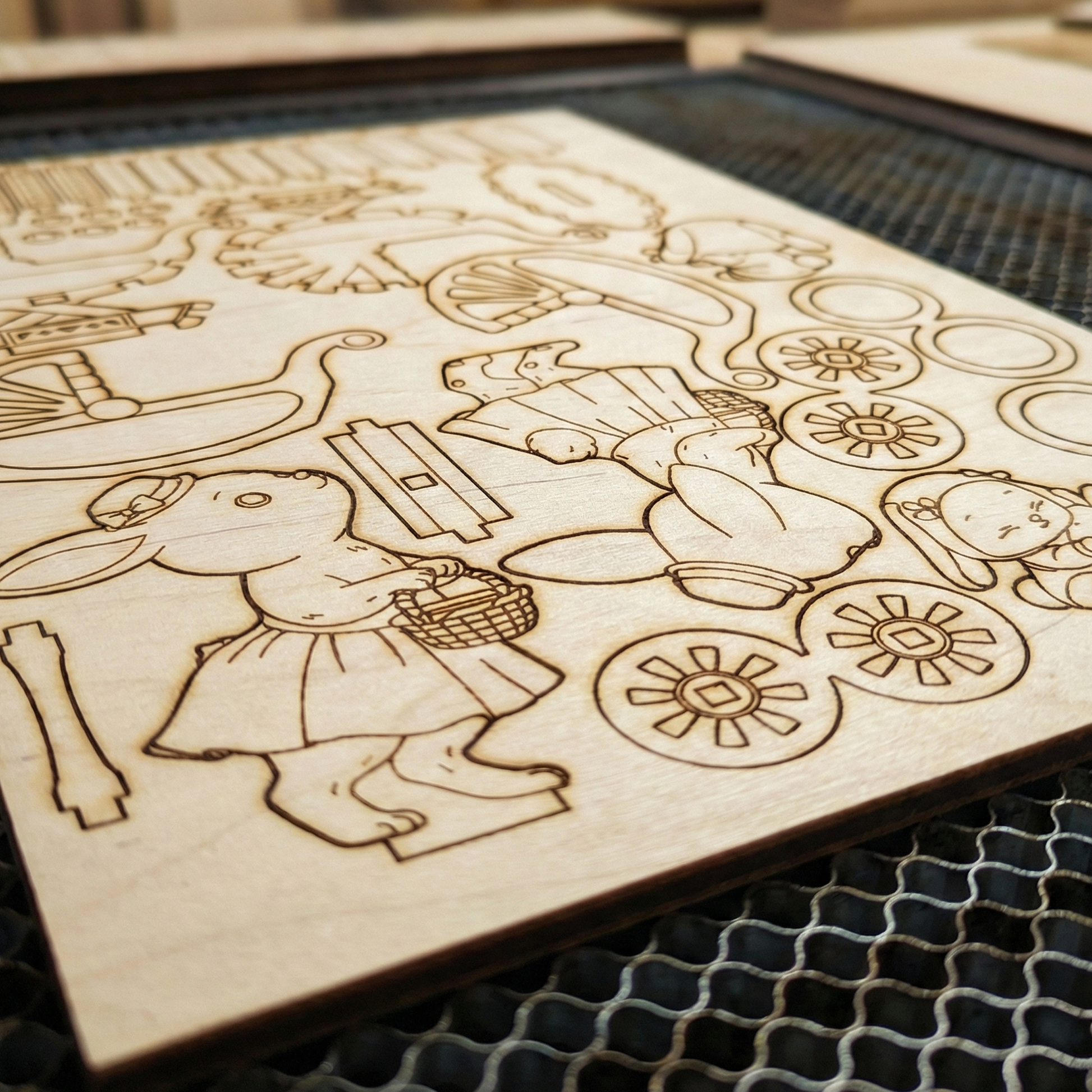Wooden cutout with laser-engraved design of a fairy tale scene on a grid surface.