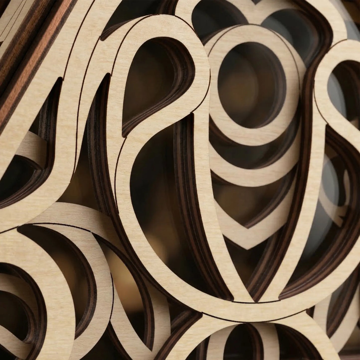 Close-up of laser cut circular patterns stacked together