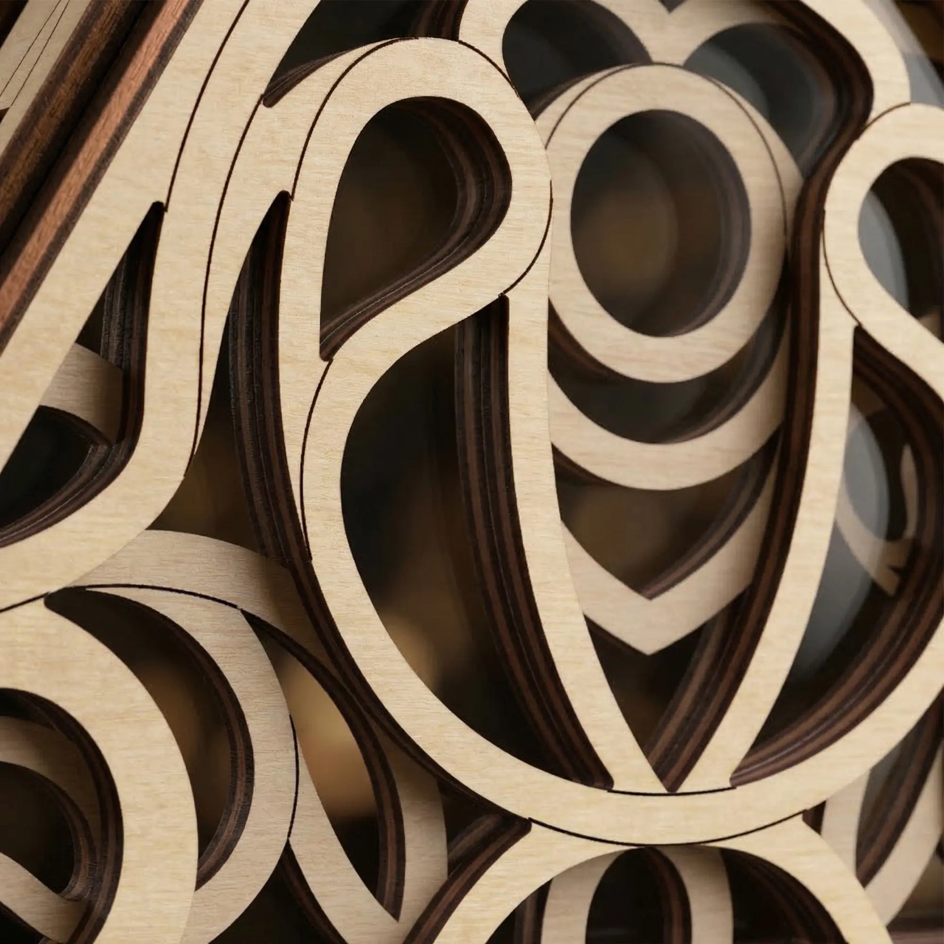 Close-up of laser cut circular patterns stacked together