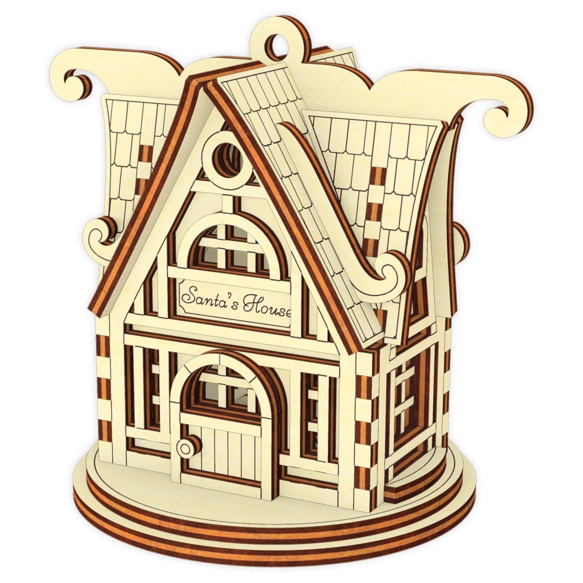 Festive miniature Christmas house made of laser cut plywood, showcasing delicate window cutouts and natural wood textures