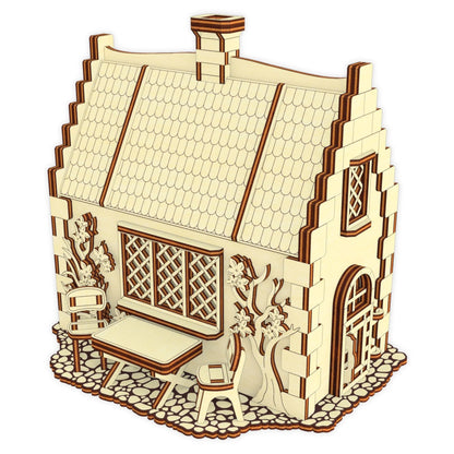 Clean isolated 3D render view of a rustic garden cottage model with miniature patio furniture, made of laser cut plywood.