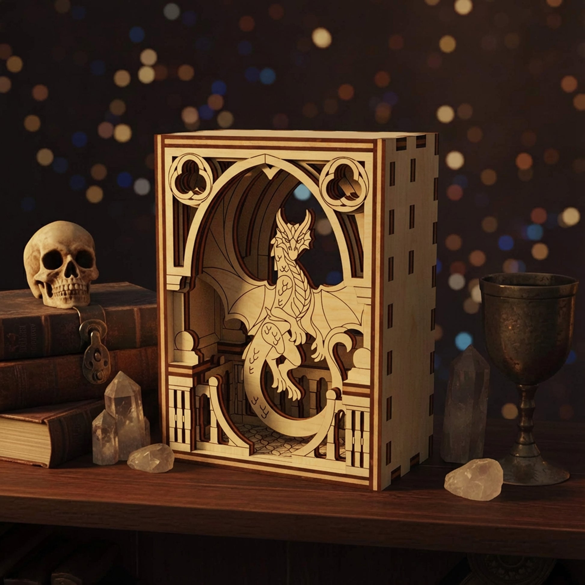 Wooden dragon laser cut model in a decorative setting with books, skull, and goblet.