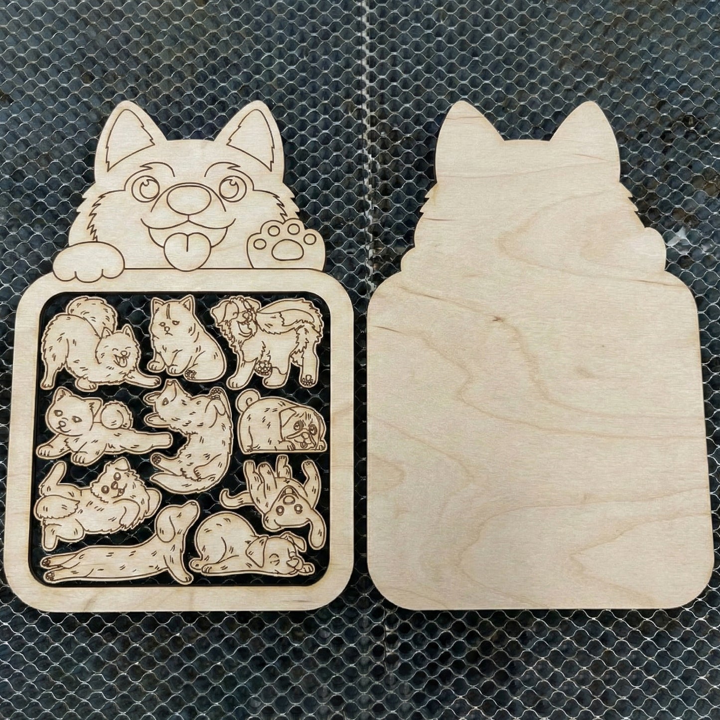 Wooden dog-shaped puzzle with laser cut-out dog designs on a textured surface