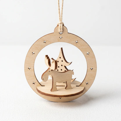 Perspective view of 3D laser cut plywood holiday bauble with moose and evergreen tree standing on white background.