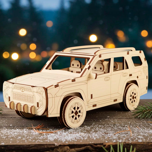 Laser cut wooden plywood 3D model placed on a rustic log with snow and pine needles. Detailed plywood assembly showing roof racks, off-road tires, and interior seating. Festive winter background with bokeh lights and a dark forest.