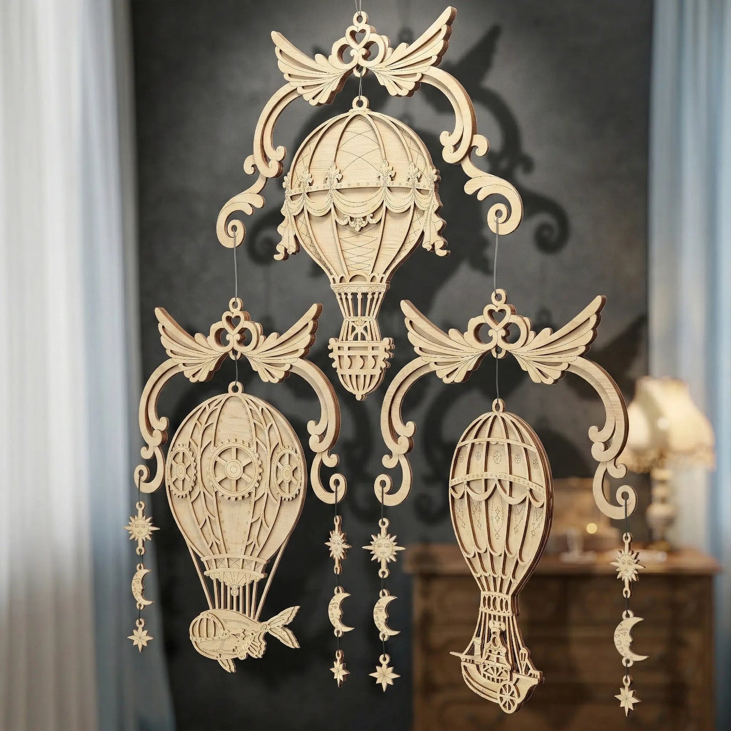 Laser cut hot air balloon wall hanging with intricate designs on a dark background.