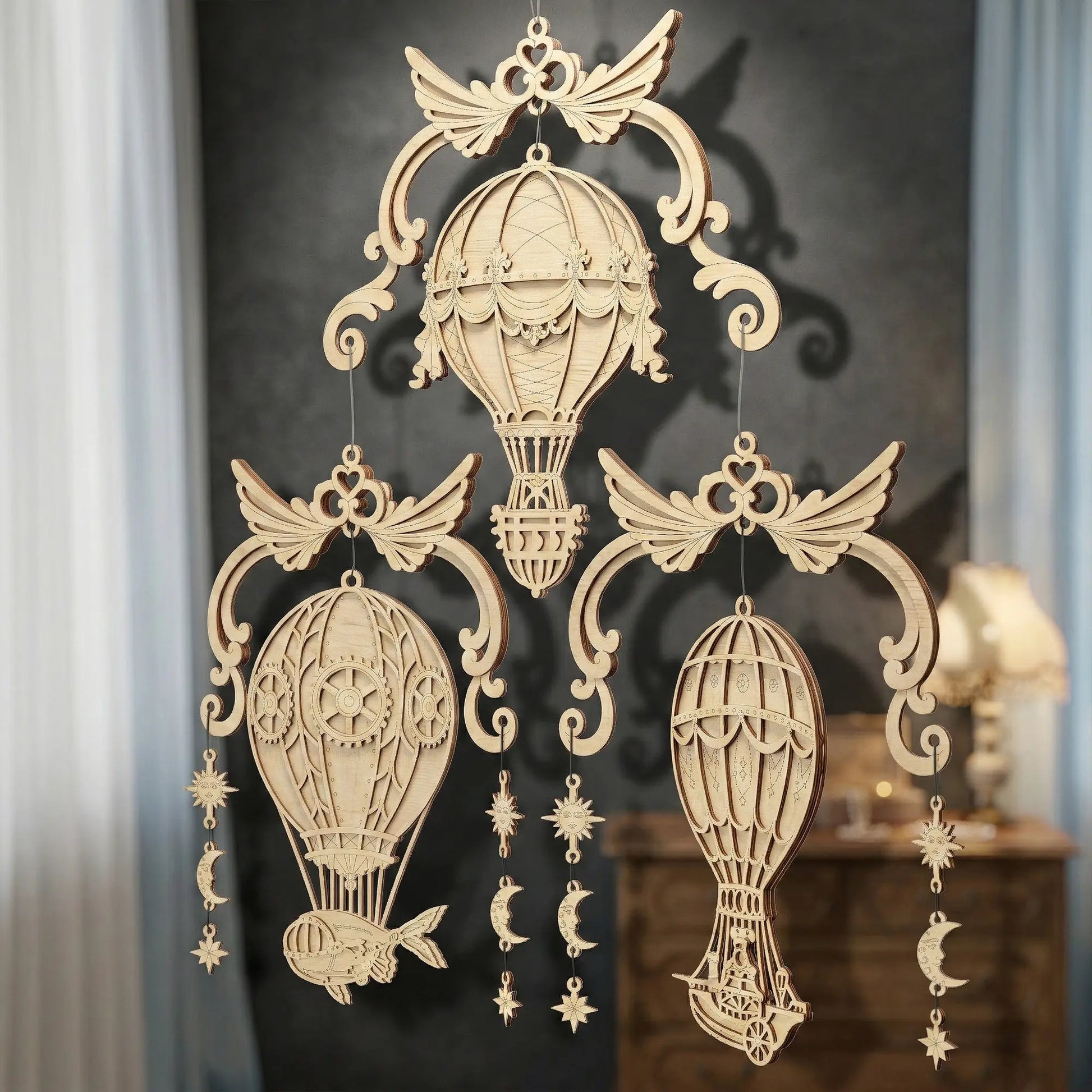 Laser cut hot air balloon wall hanging with intricate designs on a dark background.