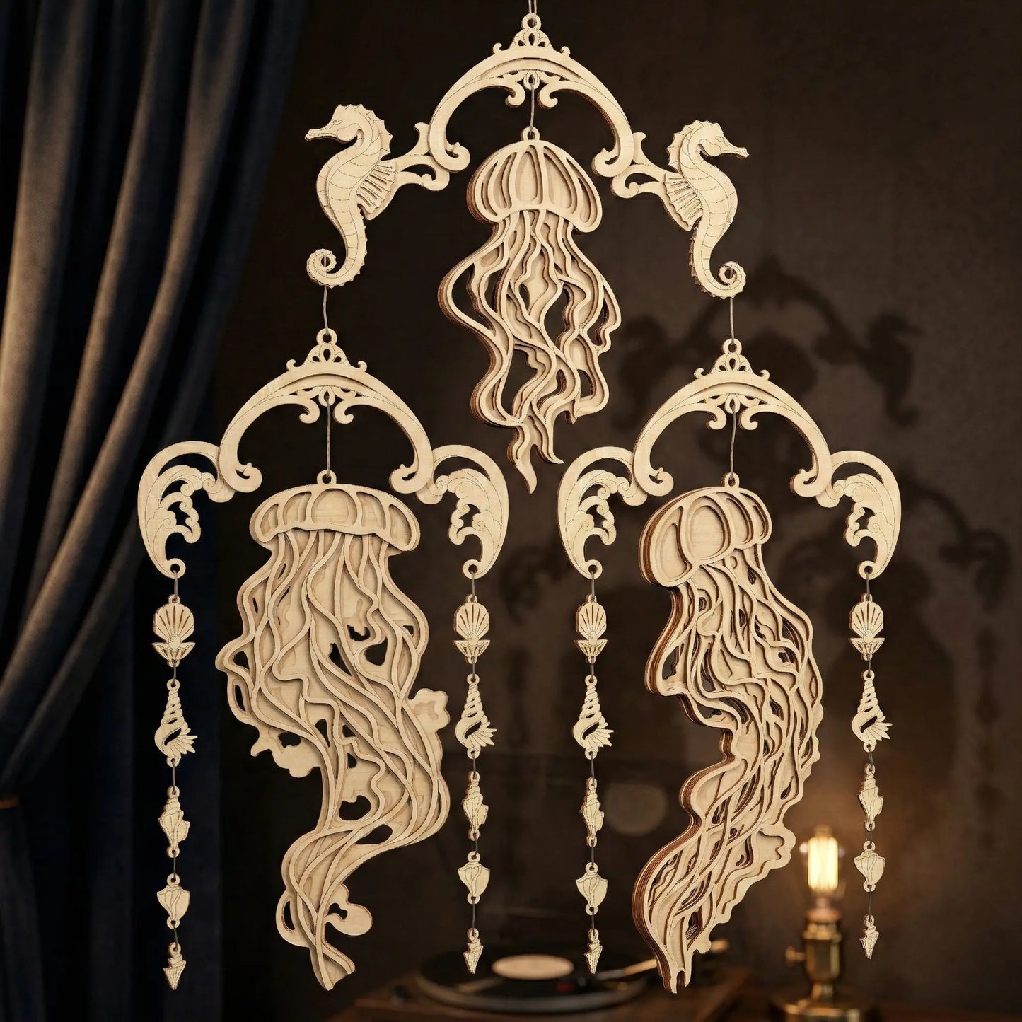Decorative laser cut wall hanging with jellyfish and seahorse designs on a dark background