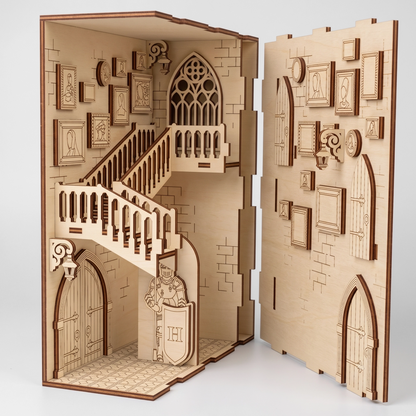 Open view of a laser-cut birch plywood castle book nook showcasing stairs, wall frames, and a knight figure with dark burnt edges.