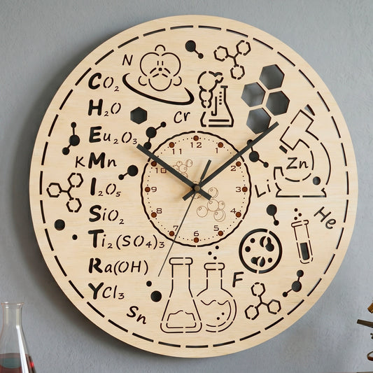 Laser cut plywood chemistry wall clock hanging on a gray wall, featuring engraved science formulas and cut out design