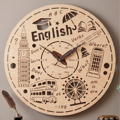 Laser cut plywood English theme wall clock with engraved London symbols, words and a feather quill hands detail.