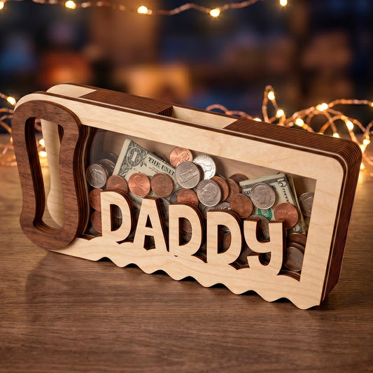 Laser cut plywood handsaw shaped bank with Daddy sign and acrylic window filled with coins and cash on a bokeh background.