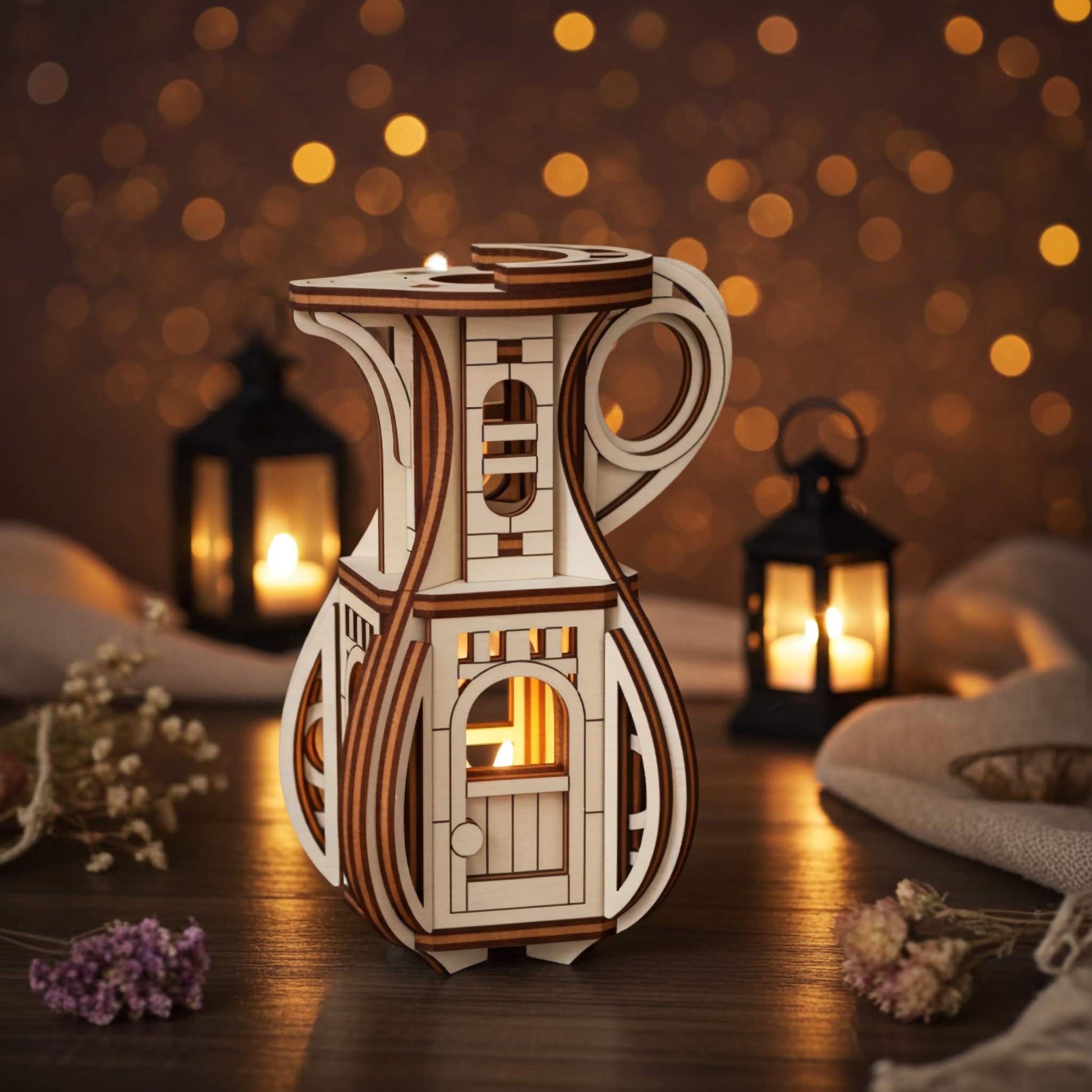 Wooden fairy house lantern shaped like a jug, laser cut from plywood, glowing with candle light on a dark table with warm bokeh lights in the background